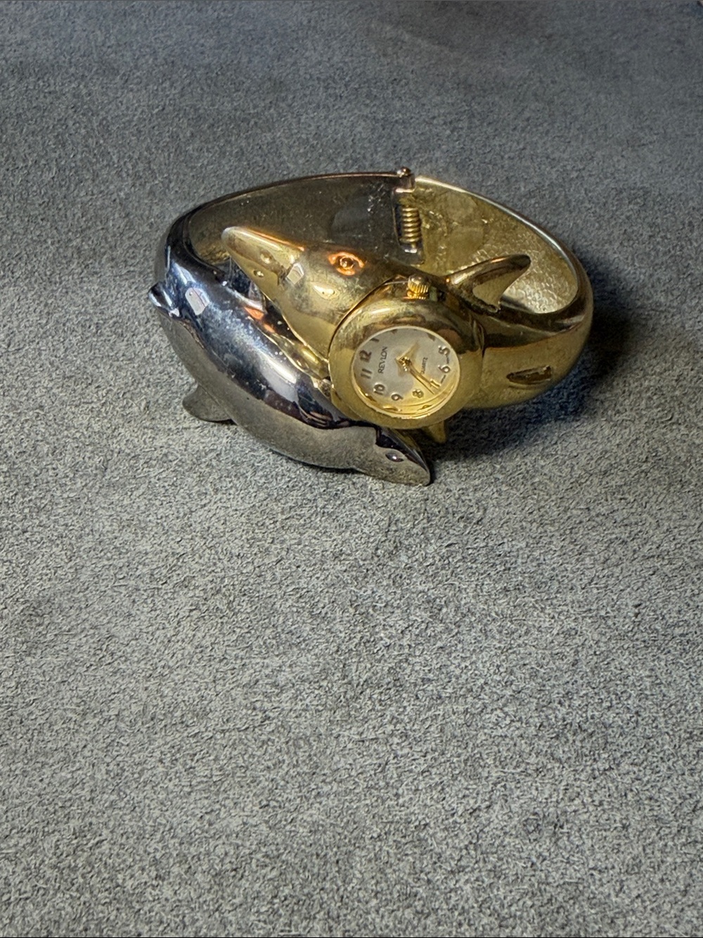 Two Tone Hinged Dolphin Bangle Revlon Watch